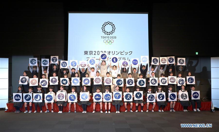Athletes and children unveil the sport pictograms for the Tokyo 2020 Summer Olympic Games with children at the unveiling event in Tokyo, Japan, on March 12, 2019. (Xinhua/Du Xiaoyi)