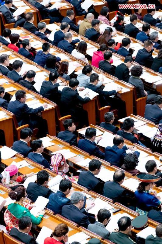 The third plenary meeting of the second session of the 13th National People\'s Congress (NPC) is held at the Great Hall of the People in Beijing, capital of China, March 12, 2019. (Xinhua/Liu Bin)