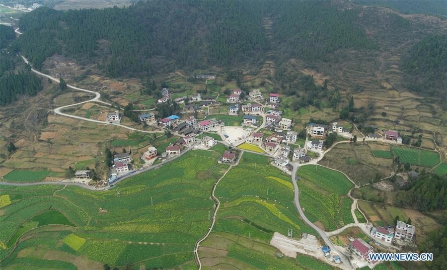 Aerial Photo taken on March 11, 2019 shows the winding concrete road at Majiatun Village of Tianping Township in Yuping County, southwest China\'s Guizhou Province. The concrete road project in Guizhou was launched in August, 2017. Up to now, Guizhou has seen 77,700 kilometers of rural roads built or renovated with nearly 40,000 villages connected by concrete roads. Tens of millions of rural people benefit from the project. (Xinhua/Hu Panxue)