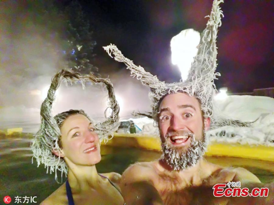 People from around the world took part in a hair freezing contest in Whitehorse, Yukon, Canada on February 13, 2019. They entered hot springs between 36 and 42 degrees Celsius and then fashioned their hair into rigid shapes as the water froze it solid.   (Photo/IC)