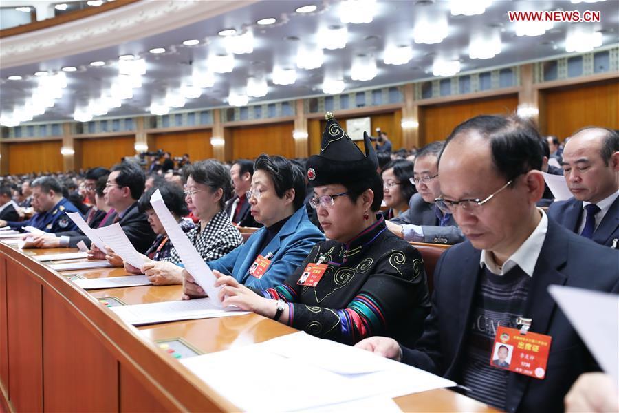 Members of the 13th National Committee of the Chinese People\'s Political Consultative Conference (CPPCC) attend the closing meeting of the second session of the 13th CPPCC National Committee at the Great Hall of the People in Beijing, capital of China, March 13, 2019. (Xinhua/Wang Ye)