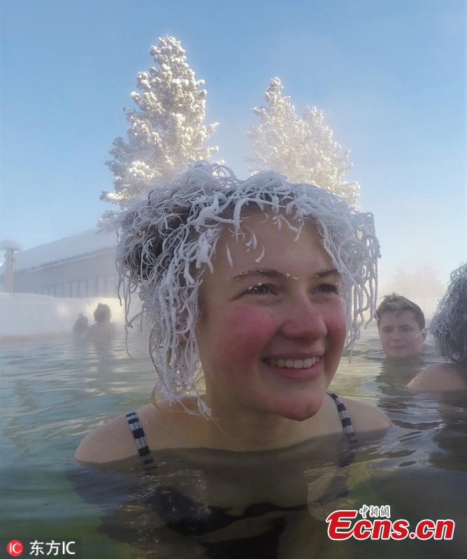 People from around the world took part in a hair freezing contest in Whitehorse, Yukon, Canada on February 13, 2019. They entered hot springs between 36 and 42 degrees Celsius and then fashioned their hair into rigid shapes as the water froze it solid.   (Photo/IC)