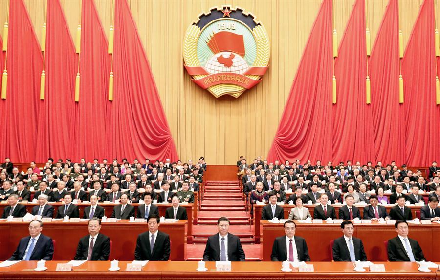 Xi Jinping (C, front), Li Keqiang (3rd R, front), Li Zhanshu (3rd L, front), Wang Huning (2nd R, front), Zhao Leji (2nd L, front), Han Zheng (1st R, front) and Wang Qishan (1st L, front) attend the closing meeting of the second session of the 13th National Committee of the Chinese People\'s Political Consultative Conference (CPPCC) at the Great Hall of the People in Beijing, capital of China, March 13, 2019. (Xinhua/Huang Jingwen)