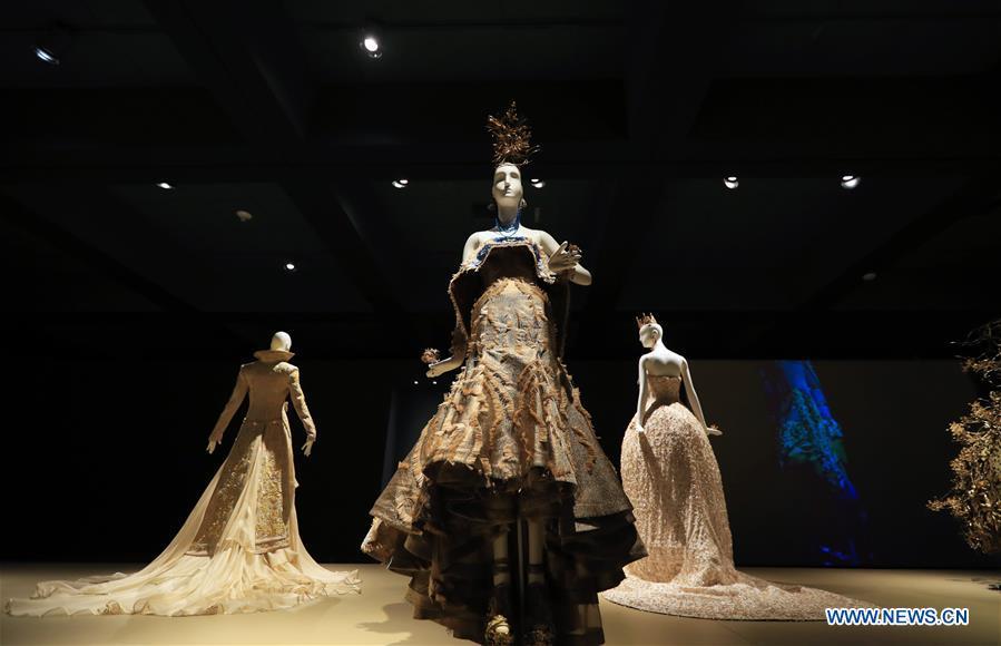 Photo taken on March 7, 2019 shows creations of Chinese couturier Guo Pei at her \