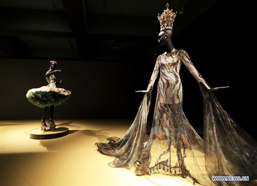 Photo taken on March 7, 2019 shows creations of Chinese couturier Guo Pei at her \