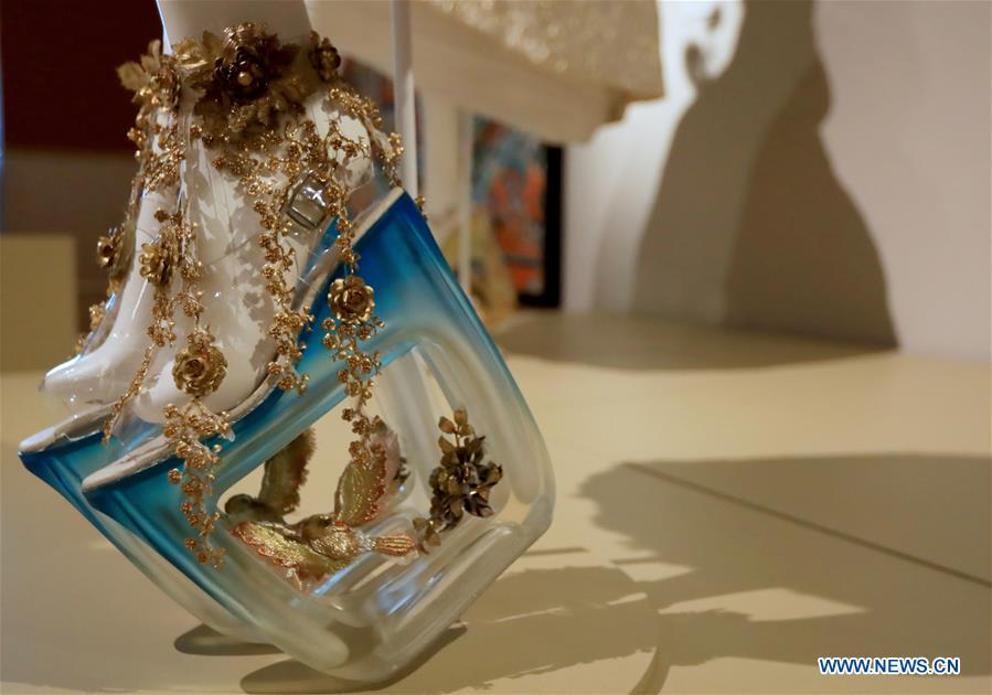 Photo taken on March 7, 2019 shows creations of Chinese couturier Guo Pei at her \