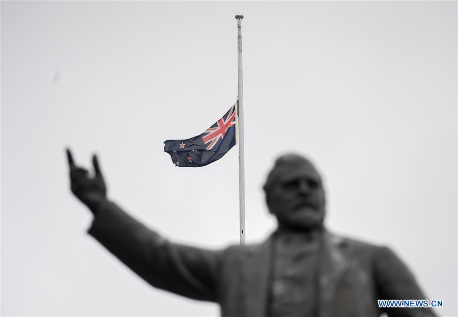 A New Zealand\'s national flag flies at half-mast in front of the parliament buildings in Wellington, capital of New Zealand, on March 16, 2019. Gunmen opened fire in two separate mosques in Christchurch on Friday, killing 49 people and wounding 48 others. (Xinhua/Guo Lei)