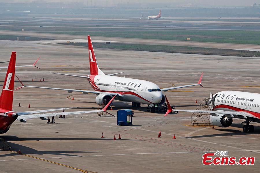 Boeing 737 MAX planes of Shanghai Airlines are grounded at Hongqiao International Airport in Shanghai, March 17, 2019. Boeing Co said on Friday its software upgrade for the grounded 737 MAX jetliner will be rolled out in the coming weeks. (Photo: China News Service/Yin Liqin)