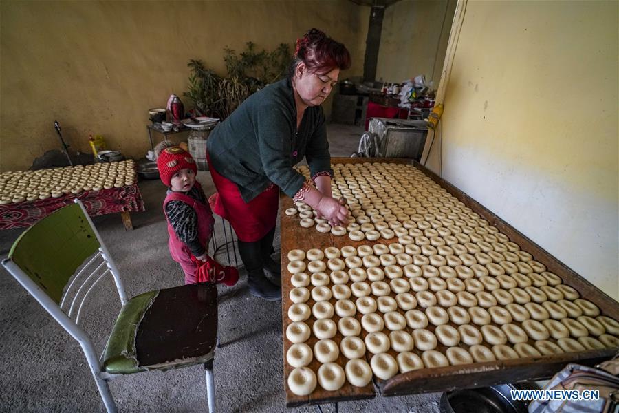 A woman makes doughs of \