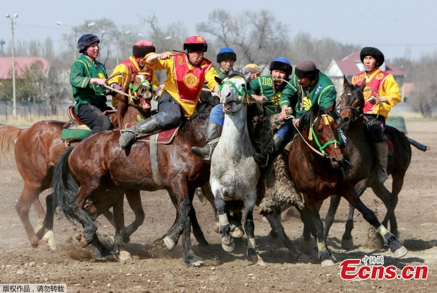 Horsemen take part in a Kok-boru, or goat dragging competition as part of Navruz celebrations, an ancient holiday marking the spring equinox, in Bishkek, Kyrgyzstan, March 18, 2019. (Photo/Agencies)