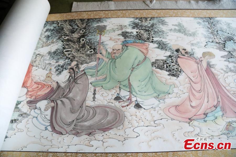 A close-up view of a painting made by Zhang Zhanping in Daixian County, Xinzhou City, North China\'s Shanxi Province, March 18, 2019. The 66-year-old farmer, also a local folk artist specializing in the making and painting of Buddhist sculptures, said he spent eight years creating nine scrolls, each weighing five kilograms and measuring 69 centimetres in width. The total length of the scrolls measured more than 300 meters. He also said he had attempted to apply for a Guinness World Record. (Photo: China News Service/Wang Bintian)