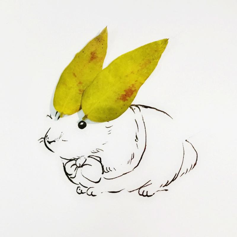he rabbit ears are replaced by real green-yellow leaves in the creative painting created by students from Lanzhou Jiaotong University in Northwest China\'s Gansu Province, March 2019.