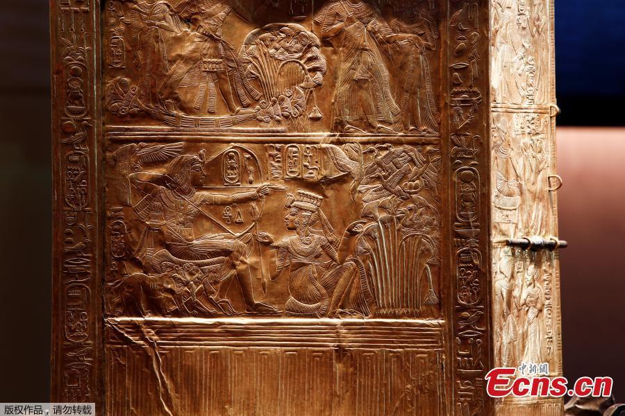 A gilded wooden statue shrine with scenes of Tutankhamun and Ankhesenamun is pictured during a press visit of the Tutankhamun, Treasures of the Golden Pharaoh exhibition, displaying more than 150 original artefacts, at the Grande Halle de la Villette in Paris, France, March 21, 2019. (Photo/Agencies)