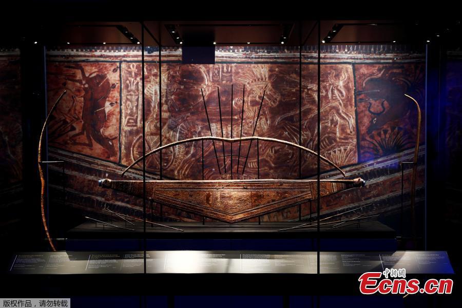 A gilded wooden bow case with scenes of Tutankhamun hunting from a chariot is pictured during a press visit of the Tutankhamun, Treasures of the Golden Pharaoh exhibition, displaying more than 150 original artefacts, at the Grande Halle de la Villette in Paris, France, March 21, 2019. (Photo/Agencies)