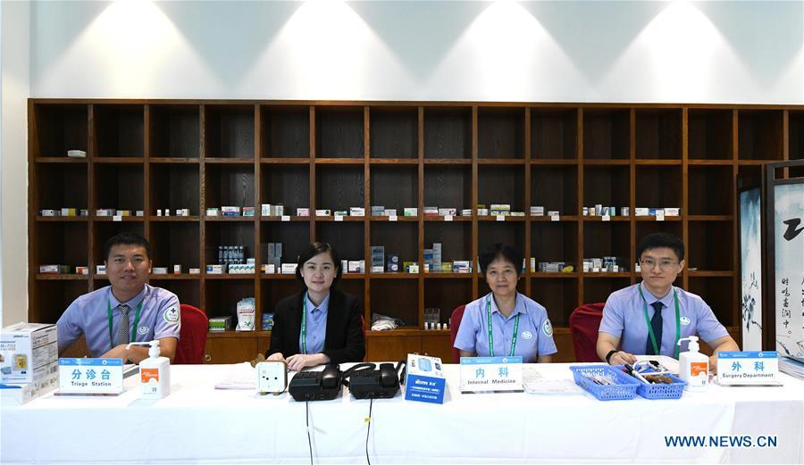 Medical staff of the Boao Forum for Asia (BFA) are seen on duty in Boao Town of Qionghai City, south China\'s Hainan Province, March 25, 2019. The BFA annual conference will be held in Boao from March 26 to 29 under the theme of \
