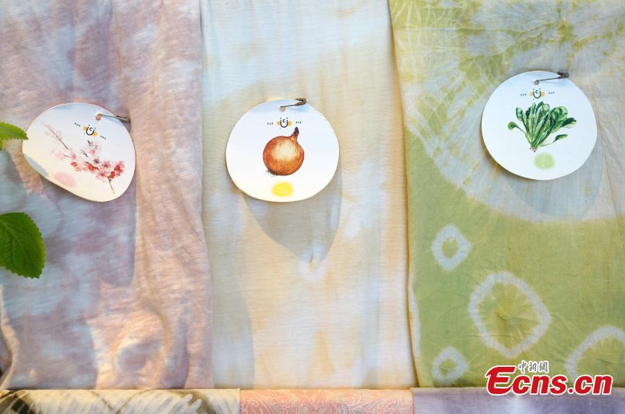 Fabrics dyed with colors at the Dyelicious studio, in Hong Kong. (Photo: China News Service/Zhang Wei)