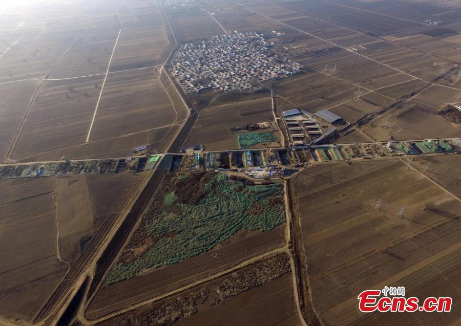 An aerial view of construction in Xiongan New Area, Hebei Province, March 27, 2019. In April 2017, China announced the establishment of the Xiongan New Area, spanning three counties in Hebei Province about 100 km southwest of Beijing. Many of Beijing\'s non-capital functions, as well as some of its population, will be relocated to Xiongan. (Photo: China News Service/Han Bing)