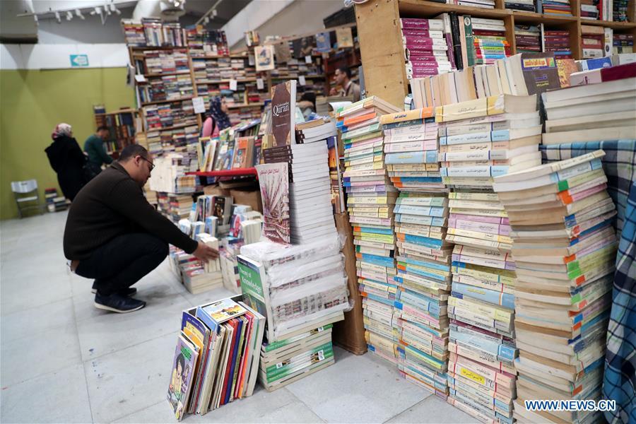 People visit the Alexandria International Book Fair in Alexandria, Egypt, March 31, 2019. The 15th Alexandria International Book Fair, the second largest exhibition in Egypt, witnessed a high visitor turnout, surprising officials of Bibliotheca Alexandria, the organizing body of the two-week event. (Xinhua/Ahmed Gomaa)