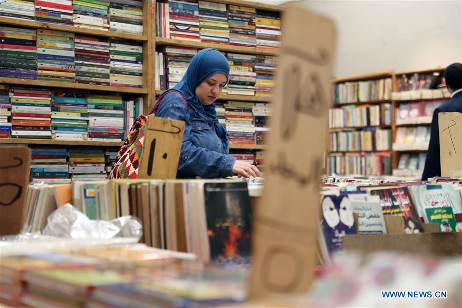 A woman visits the Alexandria International Book Fair in Alexandria, Egypt, March 31, 2019. The 15th Alexandria International Book Fair, the second largest exhibition in Egypt, witnessed a high visitor turnout, surprising officials of Bibliotheca Alexandria, the organizing body of the two-week event. (Xinhua/Ahmed Gomaa)