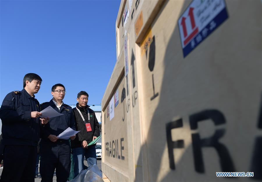 Customs officers handle formalities for Chinese cultural relics transported from Italy at Beijing International Airport in Beijing, capital of China, April 10, 2019. A total of 796 Chinese cultural relics arrived at Beijing International Airport at 6:54 a.m. Wednesday after an eight-hour flight from Italy. The group of Chinese artifacts were first noticed by a unit of Carabinieri, or the national gendarmerie of Italy, on the local relics auction market in 2007, which was followed by a domestic judicial trial. (Xinhua/Li He)
