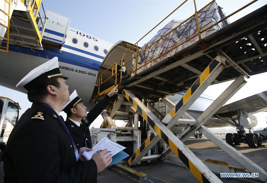 Customs officers supervise the unloading process of Chinese cultural relics transported from Italy at Beijing International Airport in Beijing, capital of China, April 10, 2019. A total of 796 Chinese cultural relics arrived at Beijing International Airport at 6:54 a.m. Wednesday after an eight-hour flight from Italy. The group of Chinese artifacts were first noticed by a unit of Carabinieri, or the national gendarmerie of Italy, on the local relics auction market in 2007, which was followed by a domestic judicial trial. (Xinhua/Chen Yinsong)