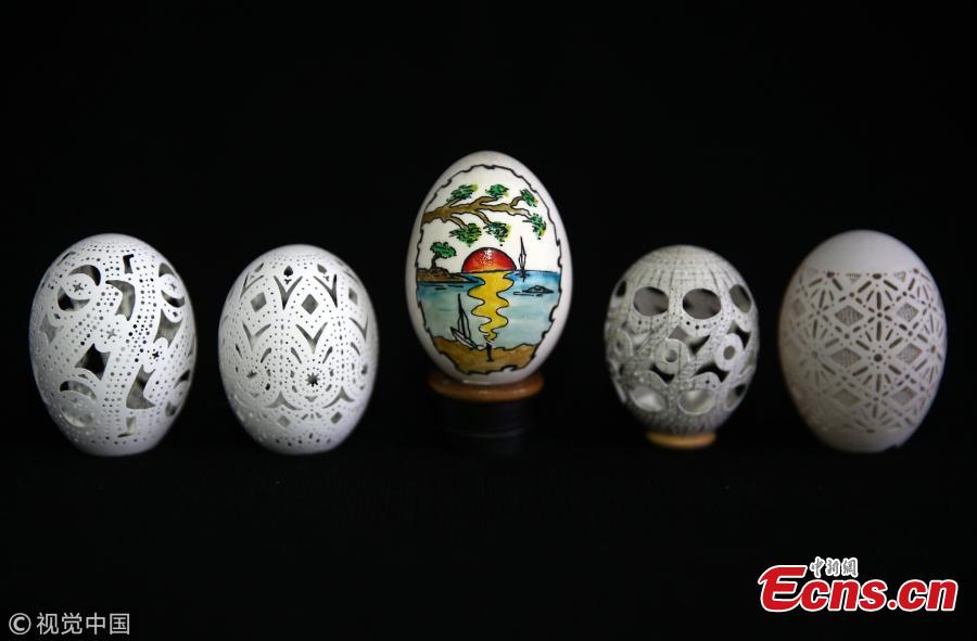 Chicken eggs, carved by Naci Eroglu 60-year-old are seen at his workshop in Adana, Turkey on April 9, 2019. (Photo/VCG)