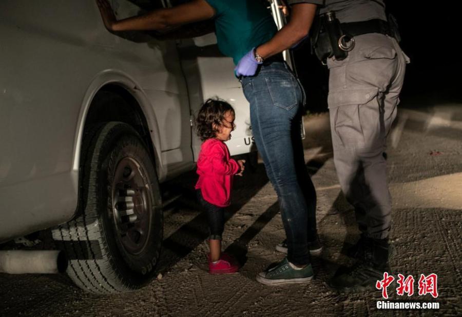 World Press Photo of the Year

John Moore\'s award-winning photo shows a two-year-old Honduran asylum seeker cries as her mother is searched and detained near the U.S.-Mexico border on June 12, 2018. (Photo: John Moore/Getty Images)