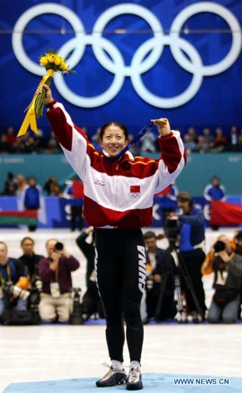 File photo taken on Feb. 16, 2002 shows China\'s Yang Yang celebrating on the podium during the awarding ceremony of the women\'s 500m event of short track speed skating at 2002 Winter Olympic Games in Salt Lake City, the United States. Yang Yang won the gold medal of the event and it was China\'s first Winter Olympic gold medal. From sending athletes to Helsinki Summer Olympic Games for the very first time in 1952 to winning the bid to host 2022 Winter Olympic Games in 2015, the People\'s Republic of China went through a remarkable history of sports, including successfully hosting the 2008 Summer Olympic Games and preparing for the upcoming 2022 Winter Olympic Games. (Xinhua/Luo Gengqian)