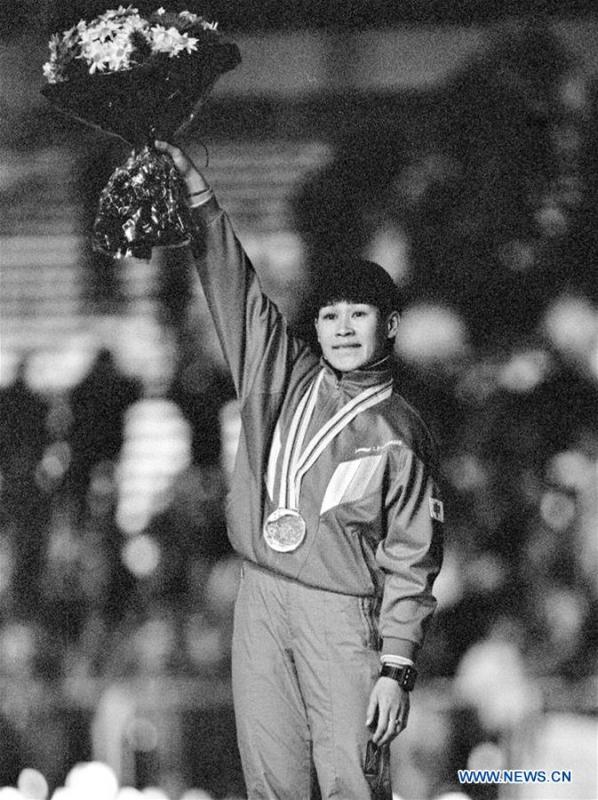File photo taken on Feb. 10, 1992 shows the second-placed Ye Qiaobo celebrating on the podium during the awarding ceremony of the women\'s 500m speed skating event at the 1992 Albertville Winter Olympics. It was China\'s first Winter Olympic medal. From sending athletes to Helsinki Summer Olympic Games for the very first time in 1952 to winning the bid to host 2022 Winter Olympic Games in 2015, the People\'s Republic of China went through a remarkable history of sports, including successfully hosting the 2008 Summer Olympic Games and preparing for the upcoming 2022 Winter Olympic Games. (Xinhua/Li Genxing)