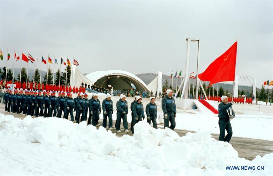 File photo taken on Feb. 13, 1980 shows Chinese delegation marching into the venue during the opening ceremony of the 13th Winter Olympic Games held in Lake Placid Stadium, the United States. This was the first time the People\'s Republic of China compete in the Winter Olympic Games. From sending athletes to Helsinki Summer Olympic Games for the very first time in 1952 to winning the bid to host 2022 Winter Olympic Games in 2015, the People\'s Republic of China went through a remarkable history of sports, including successfully hosting the 2008 Summer Olympic Games and preparing for the upcoming 2022 Winter Olympic Games. (Xinhua/Xia Daoling)