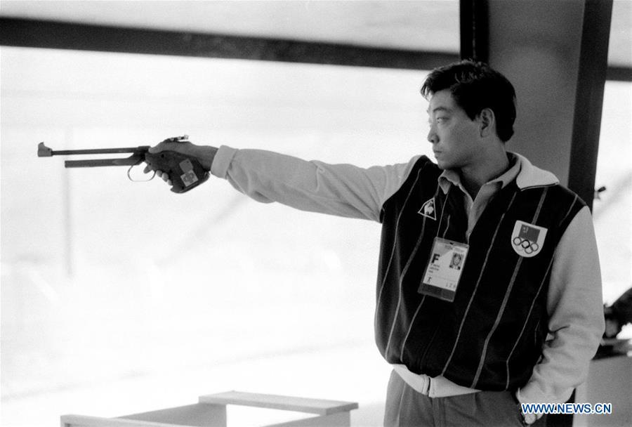 File photo taken on July 29, 1984 shows that China\'s Xu Haifeng compete in the men\'s pistol event at the 23rd Olympic Games in Los Angeles, the United States. Xu Haifeng won the gold medal of the event which was China\'s first Olympic gold medal. From sending athletes to Helsinki Summer Olympic Games for the very first time in 1952 to winning the bid to host 2022 Winter Olympic Games in 2015, the People\'s Republic of China went through a remarkable history of sports, including successfully hosting the 2008 Summer Olympic Games and preparing for the upcoming 2022 Winter Olympic Games. (Xinhua/Guan Tianyi)