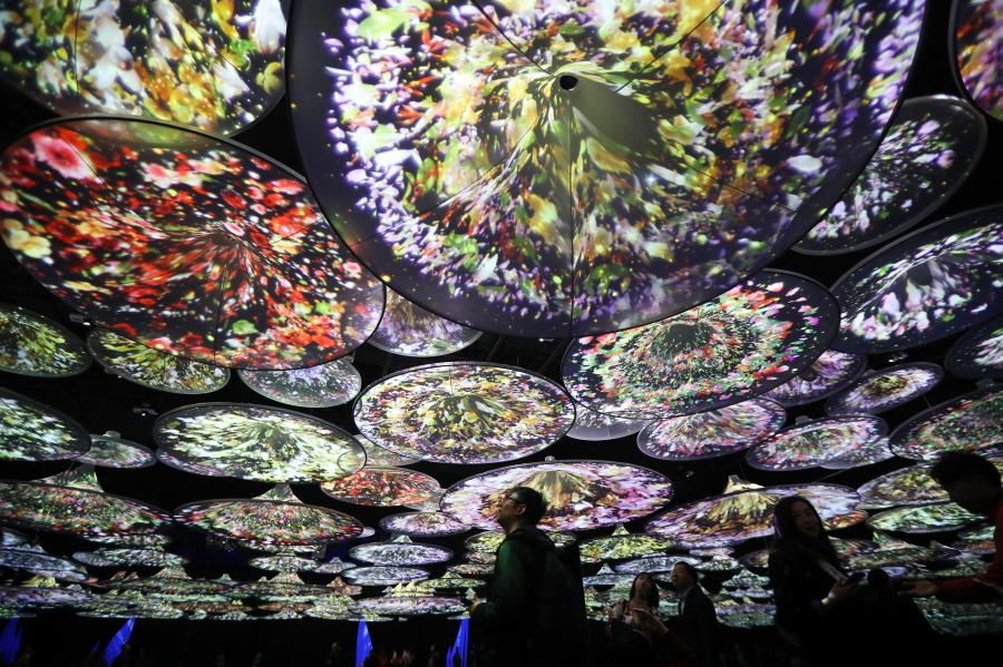 An interactive art installation project that draws inspiration from three famous paintings in Chinese history opens at a gallery in Deji Plaza, an upscale office and shopping mall complex in Nanjing, Jiangsu Province, April 11, 2019. Visitors appear to immerse themselves into scenes in the paintings. The three scrolls included \