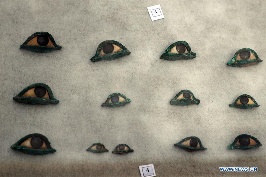 Photo taken on April 13, 2019 shows the unearthed artifacts in a tomb in Saqqara, Egypt. Egyptian Ministry of Antiquities opened on Saturday a tomb of a Fifth Dynasty dignitary which was discovered recently at Saqqara Necropolis near the Giza pyramids. Minister of Antiquities Khaled al-Anany, along with 52 ambassadors and cultural attaches of foreign, Arab and African countries, toured Saqqara Necropolis to inspect the tomb of Khuwy, who lived at the end of the Fifth Dynasty of the Old Kingdom. The Old Kingdom of Egypt is the period spanning 2686 BC to 2181 BC, which is also known as the Age of the Pyramids. (Xinhua/Ahmed Gomaa)