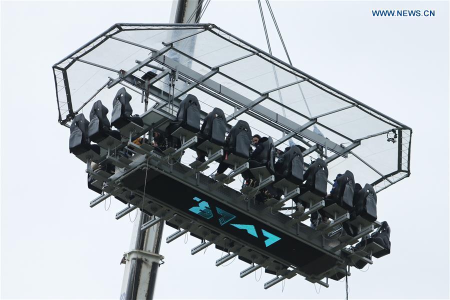 Gamers participate in Gaming in the Sky competition on a platform lifted by a crane in Zagreb, Croatia, April 13, 2019. (Xinhua/Filip Kos)