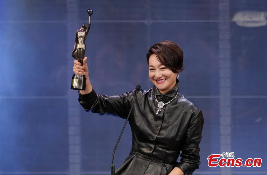 Hong Kong film star Kara Hui Ying-hung receives the Best Supporting Actress at this year\'s Hong Kong Film Awards, April 14, 2019.  Crime thriller Project Gutenberg was the night’s biggest winner, bagging seven awards, including best film, after receiving 17 nominations. (Photo: China News Service/Zhang Wei)