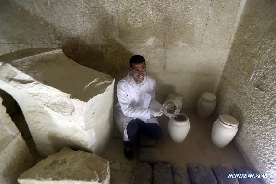 An archeologist works in a tomb in Saqqara, Egypt on April 13, 2019. Egyptian Ministry of Antiquities opened on Saturday a tomb of a Fifth Dynasty dignitary which was discovered recently at Saqqara Necropolis near the Giza pyramids. Minister of Antiquities Khaled al-Anany, along with 52 ambassadors and cultural attaches of foreign, Arab and African countries, toured Saqqara Necropolis to inspect the tomb of Khuwy, who lived at the end of the Fifth Dynasty of the Old Kingdom. The Old Kingdom of Egypt is the period spanning 2686 BC to 2181 BC, which is also known as the Age of the Pyramids. (Xinhua/Ahmed Gomaa)