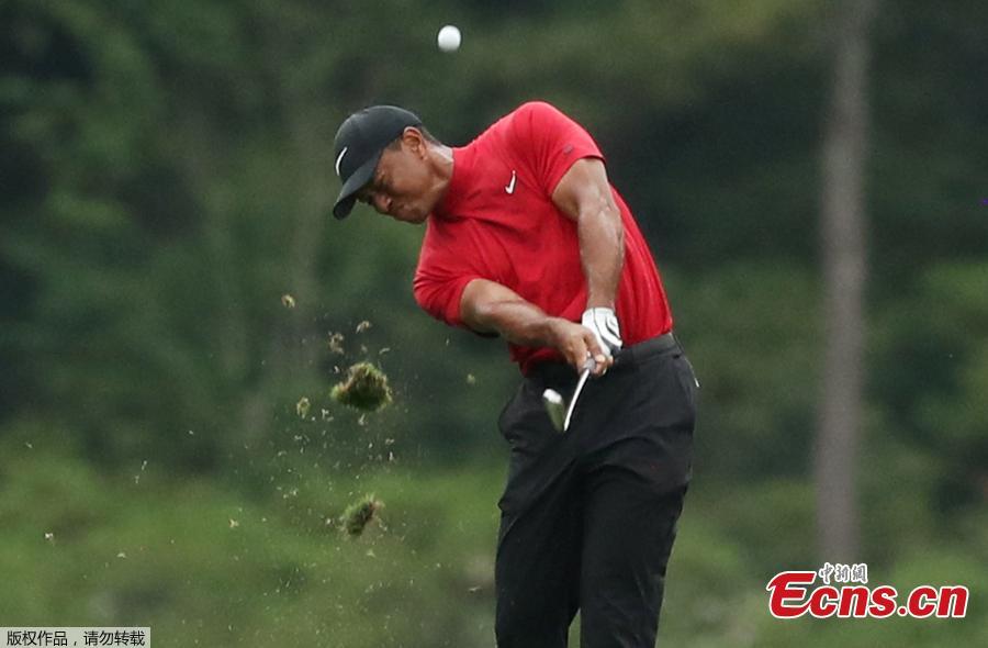 Tiger Woods hits a shot during the final round of the Masters in Augusta, Georgia, on April 14, 2019.  (Photo/Agencies)