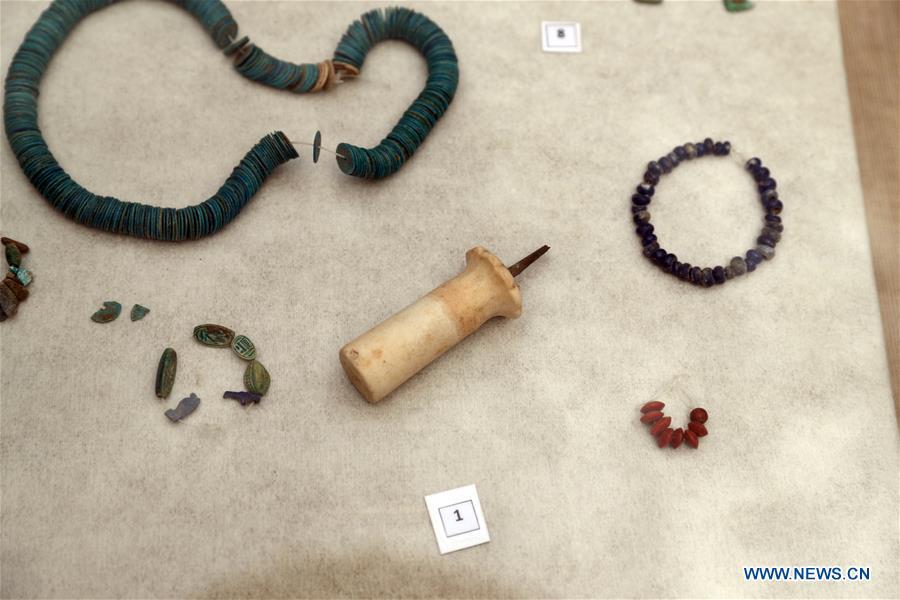 Photo taken on April 13, 2019 shows the unearthed artifacts in a tomb in Saqqara, Egypt. Egyptian Ministry of Antiquities opened on Saturday a tomb of a Fifth Dynasty dignitary which was discovered recently at Saqqara Necropolis near the Giza pyramids. Minister of Antiquities Khaled al-Anany, along with 52 ambassadors and cultural attaches of foreign, Arab and African countries, toured Saqqara Necropolis to inspect the tomb of Khuwy, who lived at the end of the Fifth Dynasty of the Old Kingdom. The Old Kingdom of Egypt is the period spanning 2686 BC to 2181 BC, which is also known as the Age of the Pyramids. (Xinhua/Ahmed Gomaa)