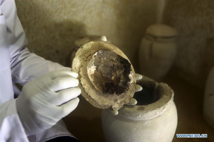 An archeologist works in a tomb in Saqqara, Egypt on April 13, 2019. Egyptian Ministry of Antiquities opened on Saturday a tomb of a Fifth Dynasty dignitary which was discovered recently at Saqqara Necropolis near the Giza pyramids. Minister of Antiquities Khaled al-Anany, along with 52 ambassadors and cultural attaches of foreign, Arab and African countries, toured Saqqara Necropolis to inspect the tomb of Khuwy, who lived at the end of the Fifth Dynasty of the Old Kingdom. The Old Kingdom of Egypt is the period spanning 2686 BC to 2181 BC, which is also known as the Age of the Pyramids. (Xinhua/Ahmed Gomaa)