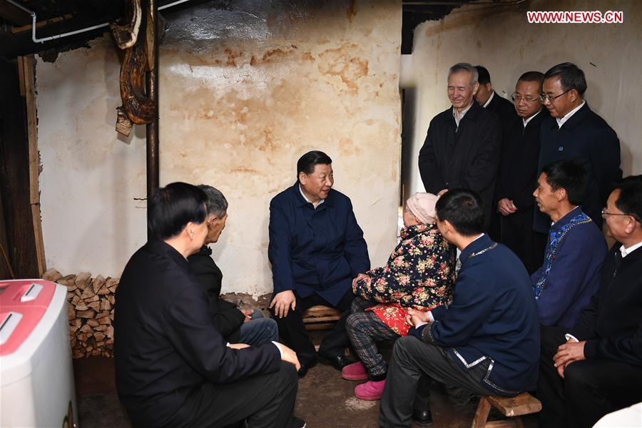 Chinese President Xi Jinping, also general secretary of the Communist Party of China Central Committee and chairman of the Central Military Commission, visits a villager\'s home to learn about the progress of poverty alleviation and in solving prominent problems including meeting the basic need of food and clothing and guaranteeing compulsory education, basic medical care and safe housing, in Huaxi Village of Shizhu Tujia Autonomous County, southwest China\'s Chongqing, April 15, 2019. Xi went on an inspection tour in southwest China\'s Chongqing Municipality Monday. (Xinhua/Xie Huanchi)