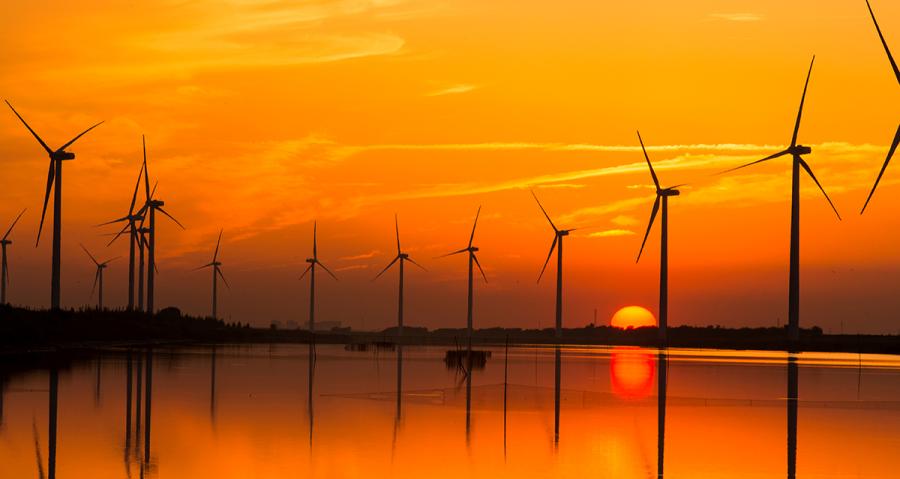 Wind turbines erected in water at a wind farm.(Photo/Tianjin Municipal Information Office)