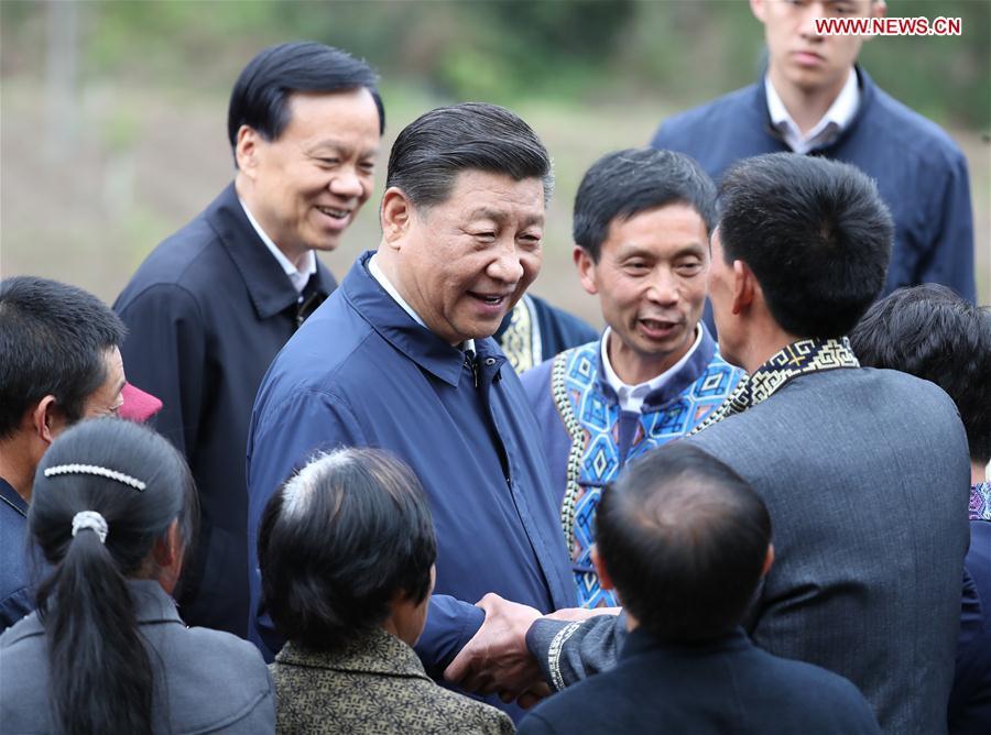Chinese President Xi Jinping, also general secretary of the Communist Party of China Central Committee and chairman of the Central Military Commission, talks with villagers in Huaxi Village of Shizhu Tujia Autonomous County, southwest China\'s Chongqing, April 15, 2019. Xi went on an inspection tour in southwest China\'s Chongqing Municipality Monday. (Xinhua/Ding Haitao)