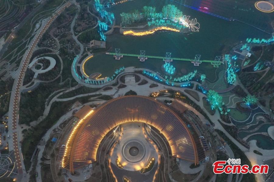 The lights are tested at the site of the 2019 Beijing International Horticultural Exhibition in Beijing in this aerial photo taken on April 16, 2019. Set to kick off on April 29, the 162-day expo is poised to impress an estimated 16 million visitors from home and abroad with a huge collection of plants, flowers and eye-catching pavilions as well as ideas for green development. (Photo/IC)