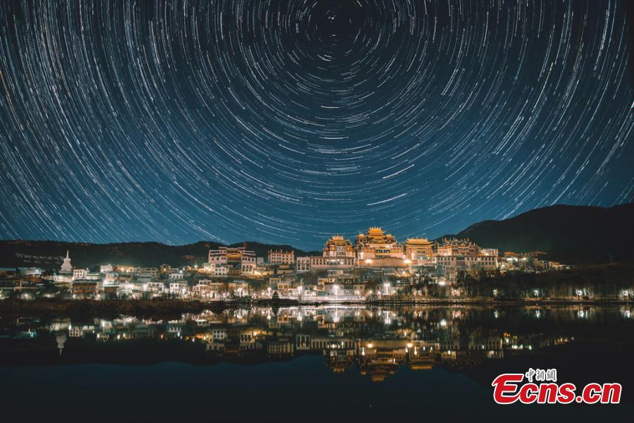Stars in the night sky over the Ganden Sumtseling Monastery, the largest Tibetan Buddhist temple in Yunnan Province. (Photo/IC)