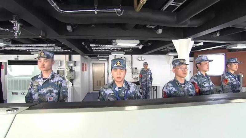 Navy soldiers work on China\'s first domestically made aircraft carrier. (Photo/CCTV)