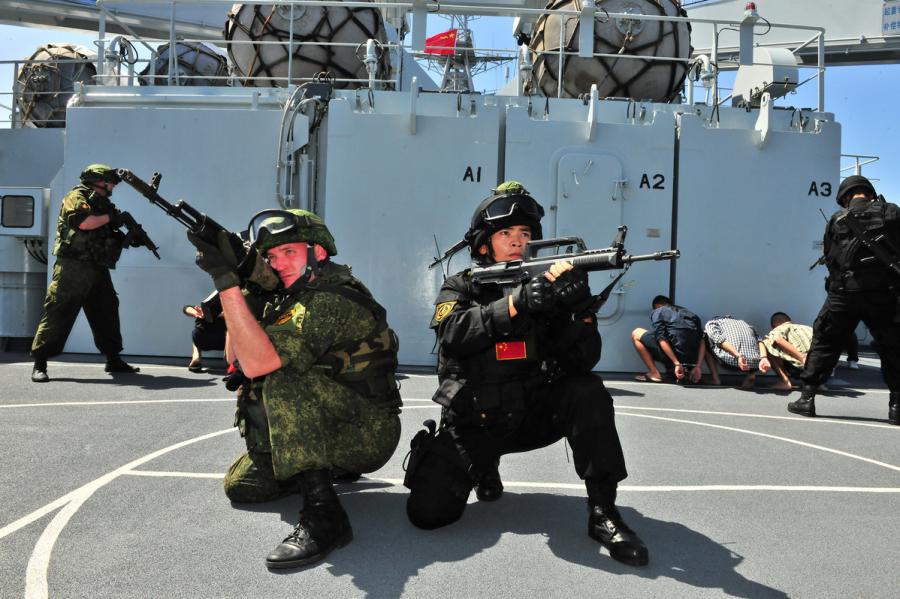 Special forces teams from China and Russia participate in a joint action exercise during the \