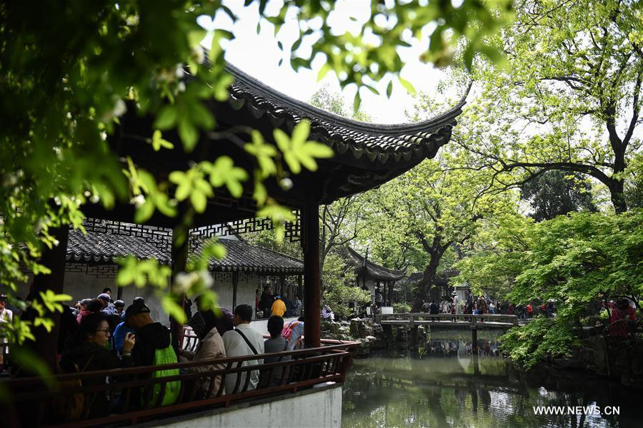 People visit the Humble Administrator\'s Garden in Suzhou, east China\'s Jiangsu Province, April 17, 2019. Suzhou is home to dozens of famous classical gardens that have inventive and exquisite design and oriental aesthetics. Nowadays more than 60 of them are still in existence, among which the Humble Administrator\'s Garden, Lingering Garden and the Lion Grove Garden are on the UNESCO\'s World Heritage List. (Xinhua/Li Xiang)