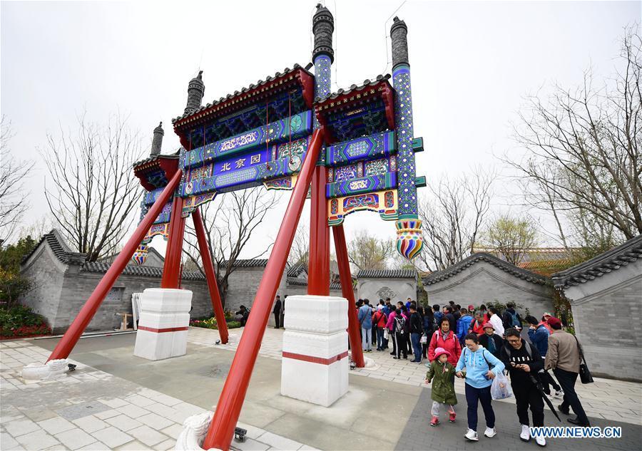Visitors tour the Beijing Garden of the 2019 Beijing International Horticultural Exhibition (Expo 2019 Beijing) during a trial run in Yanqing District of Beijing, capital of China, April 20, 2019. Beijing on Saturday held a trial opening of the site for the upcoming 2019 Beijing International Horticultural Exhibition to test the reception capacity of the event. About 60,000 people visited the 503-hectare expo site Saturday. (Xinhua/Zhang Chenlin)