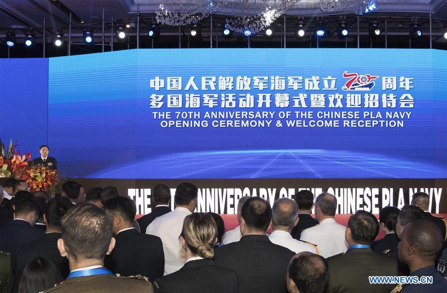 Commander of the Chinese People\'s Liberation Army (PLA) Navy Shen Jinlong delivers a speech during the opening ceremony of the multinational naval events commemorating the 70th founding anniversary of the PLA Navy in Qingdao, east China\'s Shandong Province, April 22, 2019. (Xinhua/Ju Zhenhua)