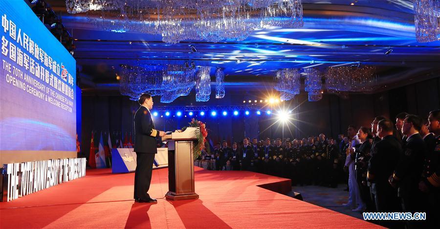 Commander of the Chinese People\'s Liberation Army (PLA) Navy Shen Jinlong delivers a speech during the opening ceremony of the multinational naval events commemorating the 70th founding anniversary of the PLA Navy in Qingdao, east China\'s Shandong Province, April 22, 2019. (Xinhua/Ju Zhenhua)
